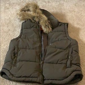 Warm brown vest with fur hood
